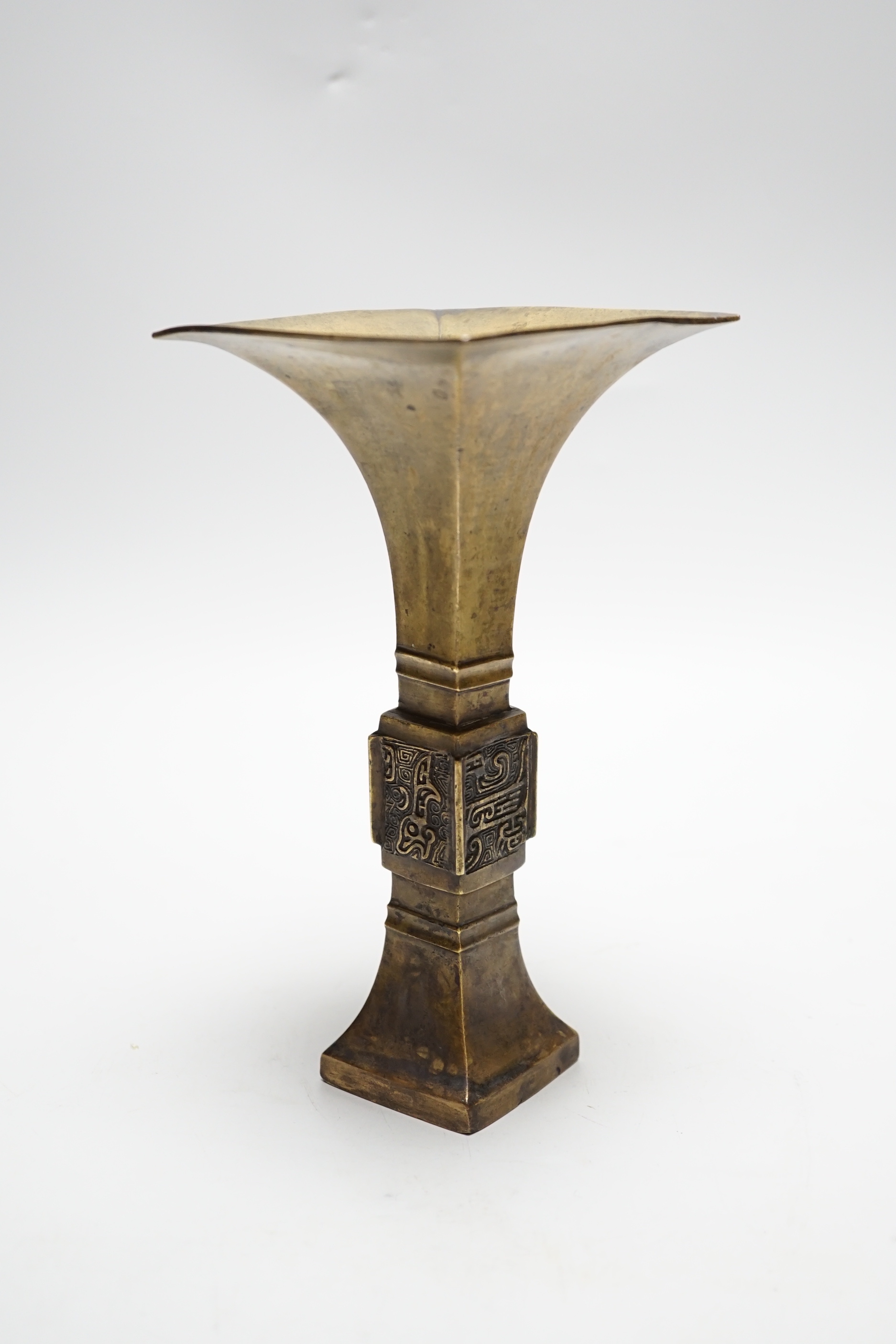An 18th/19th century Chinese archaistic bronze fanggu vase, 20cm